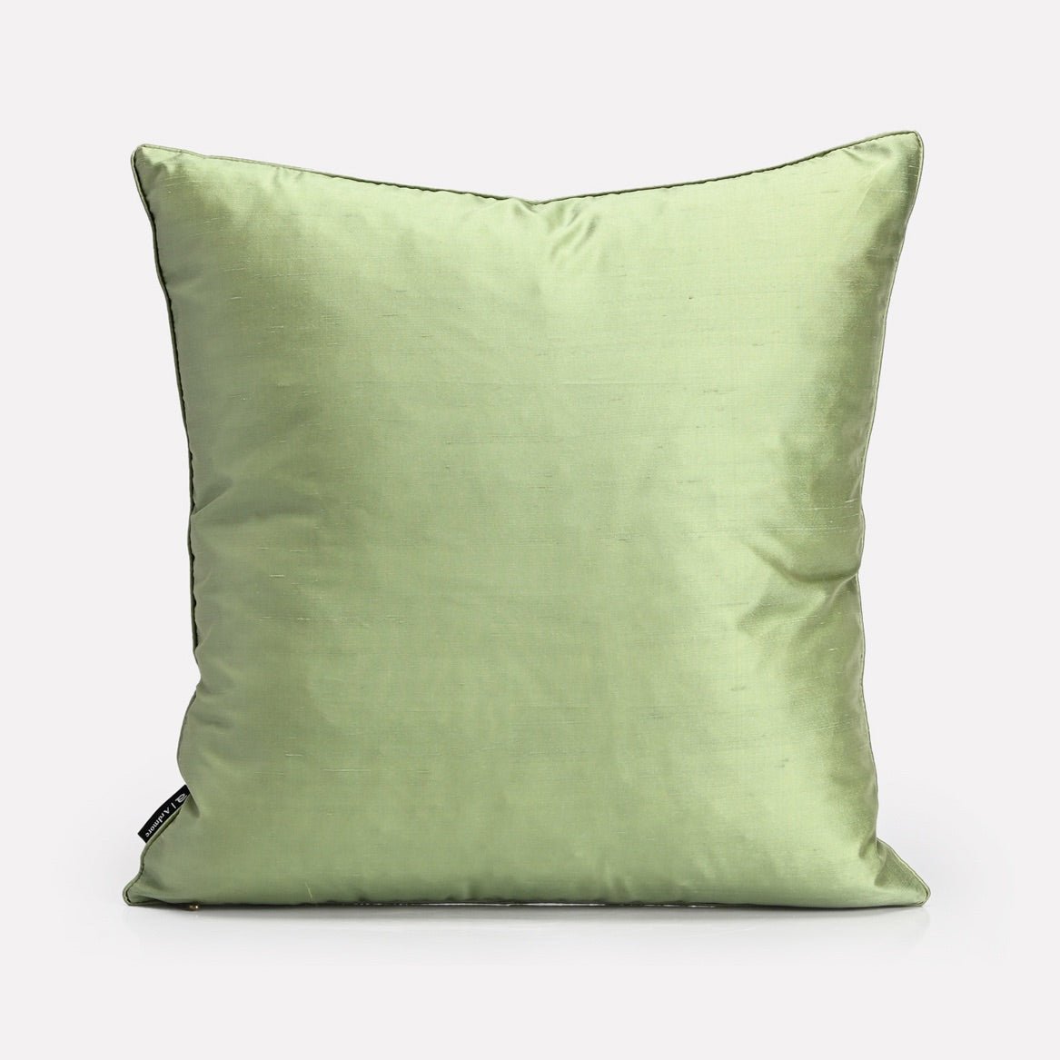 A solid pastel green silk back, offering a versatile and elegant look.