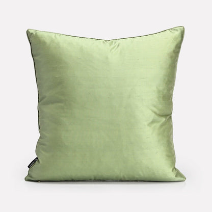 A solid pastel green silk back, offering a versatile and elegant look.