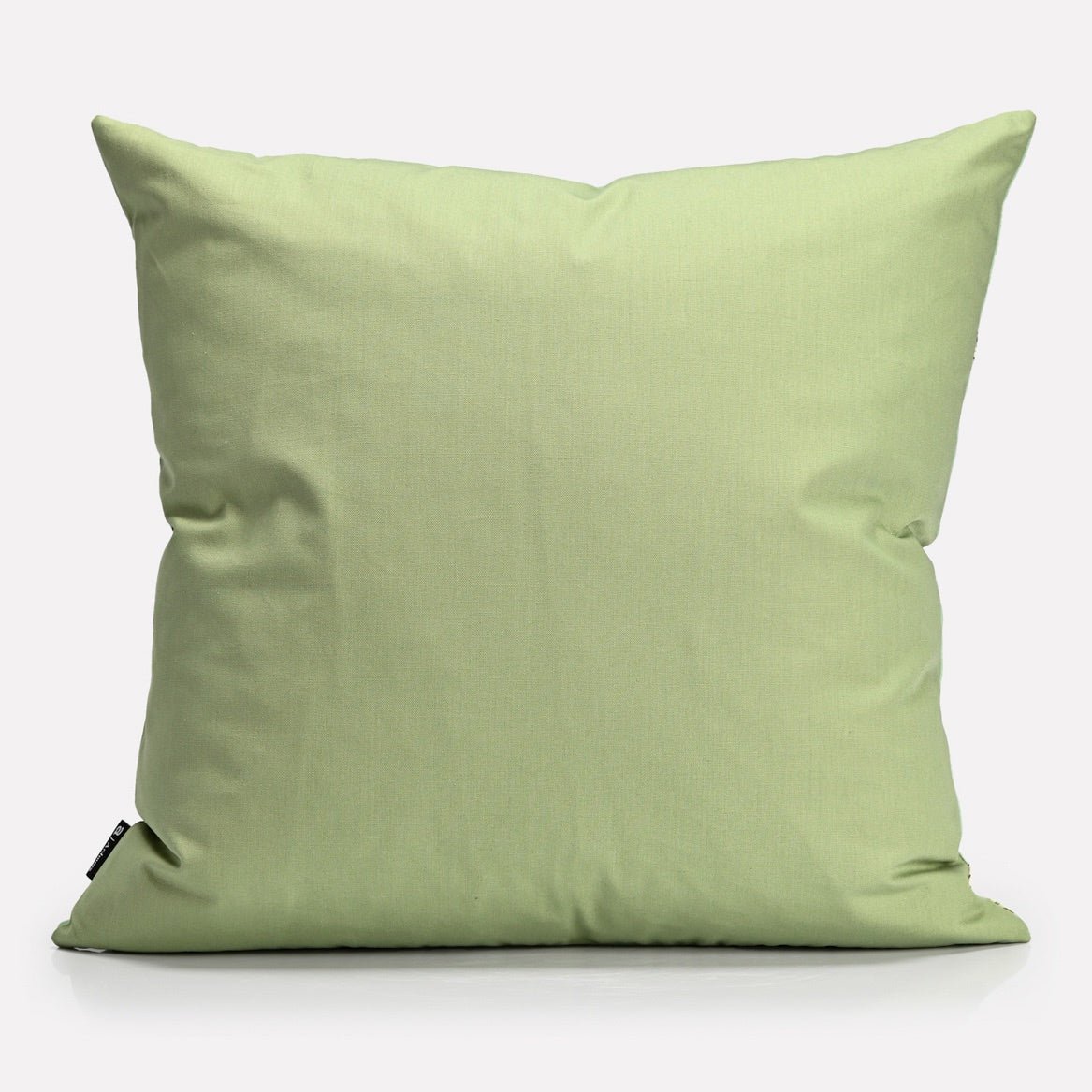 A solid pastel green velvet back, offering a versatile and sophisticated aesthetic.