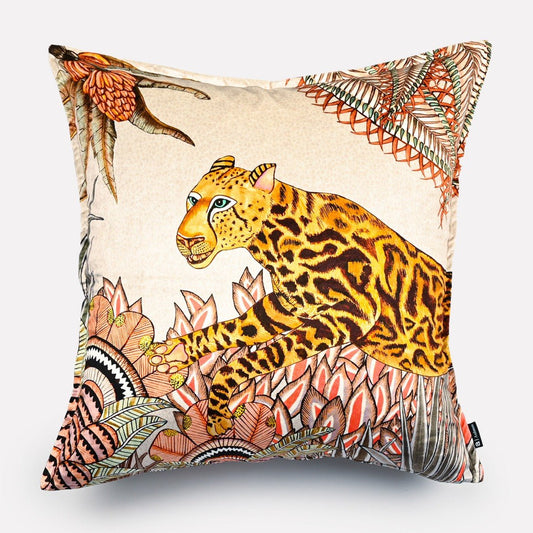 60x60cm Cheetah Kings Forest Magnolia velvet cushion cover, featuring a majestic cheetah surrounded by lush magnolia blossoms and foliage in warm gold, orange, and cream tones on a soft velvet background.