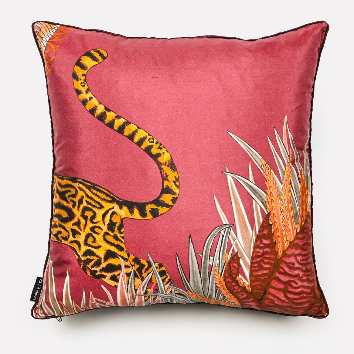 Back view of the Cheetah Kings Forest Plum Silk cushion cover showing the cheetah's tail in a minimalist plum silk design.