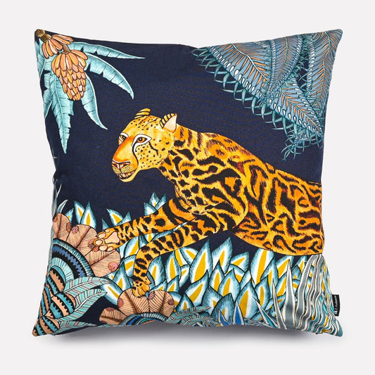 50x50cm Cheetah Kings Forest Tanzanite Cotton cushion cover featuring a vibrant African-inspired tanzanite cheetah design with bold foliage against a rich navy blue background.