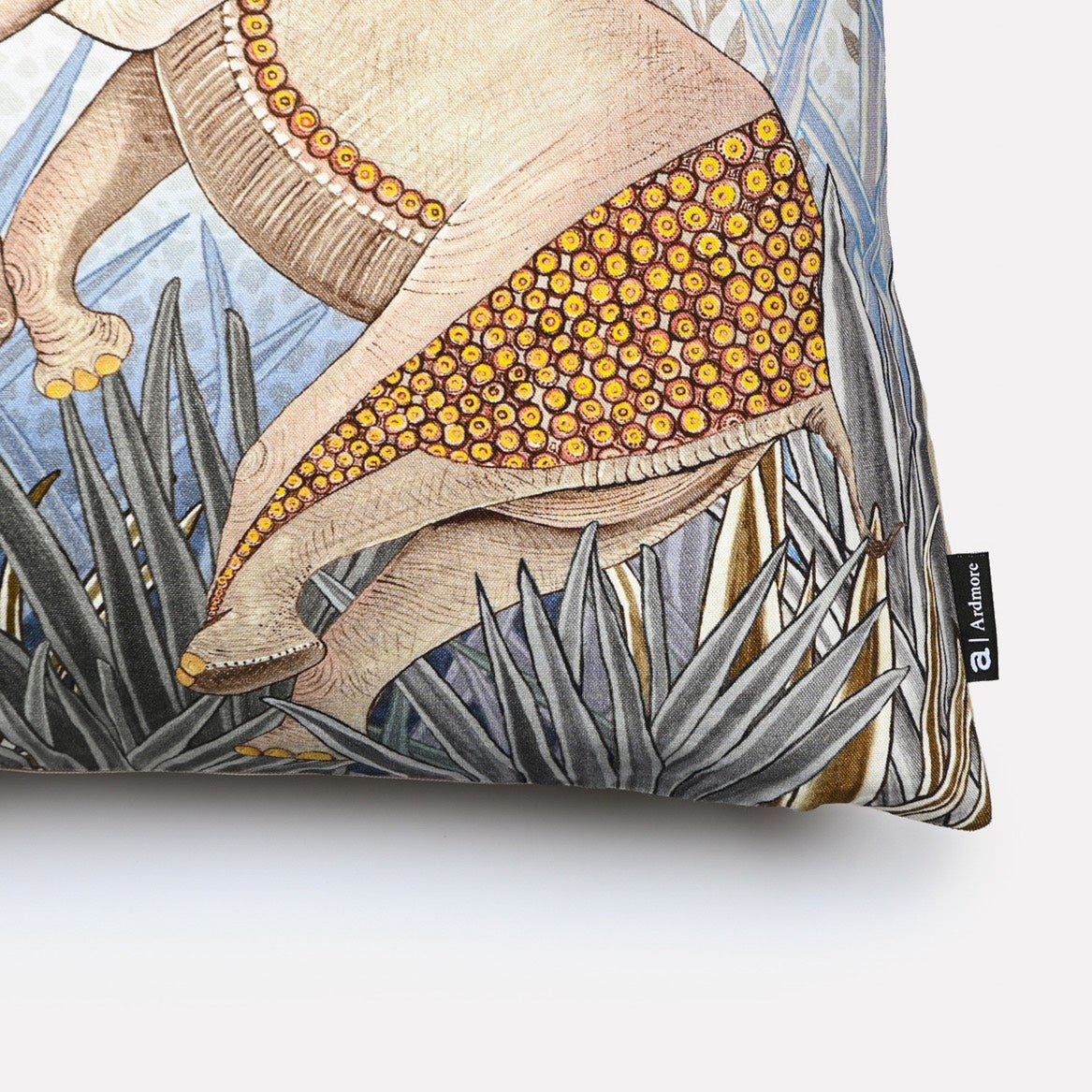 Angled close-up of the Dancing Elephant Mist cotton cushion cover, highlighting the fine patterns of the elephants and the delicate mist-inspired accents on the soft cotton fabric.