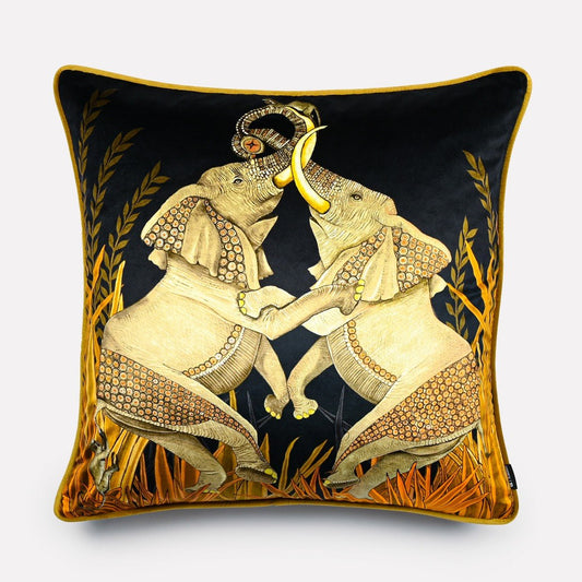 60x60cm Dancing Elephant Moonlight velvet cushion cover, featuring two intricately detailed elephants dancing gracefully against a dramatic black background bathed in golden moonlight.