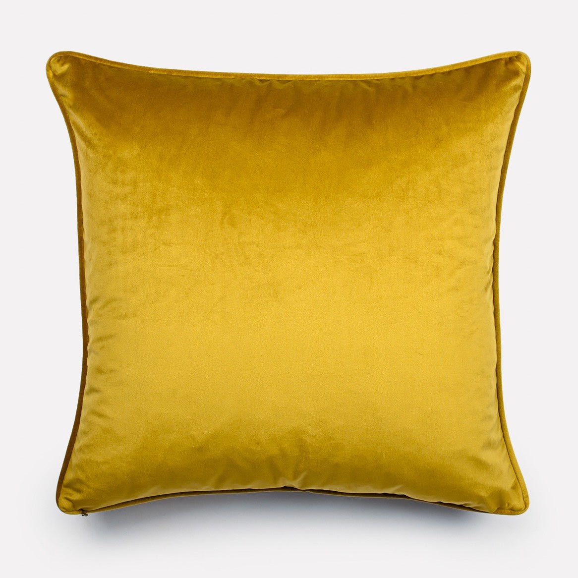 Reverse side of the Dancing Elephant Moonlight cushion cover, showcasing a solid gold velvet fabric that complements the intricate front design.