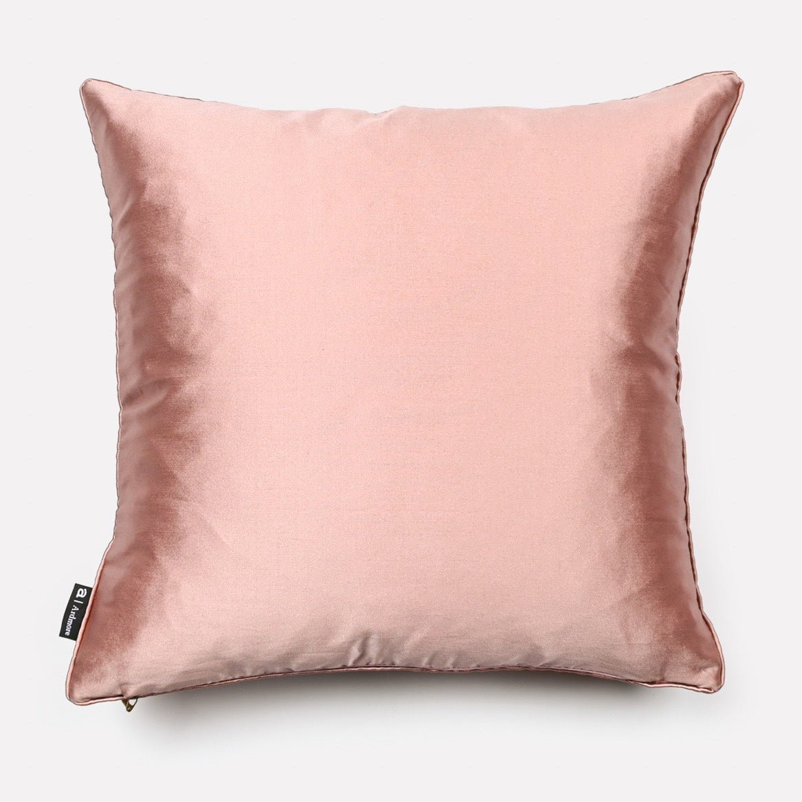 Reverse side of the Dancing Elephant Sunset silk cushion cover, showcasing a soft solid pink silk fabric that complements the bold design on the front.