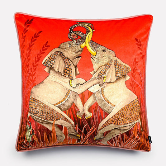 60x60cm Dancing Elephant Sunset velvet cushion cover, featuring two elegant elephants dancing gracefully against a vibrant red-orange sunset background with detailed foliage accents.
