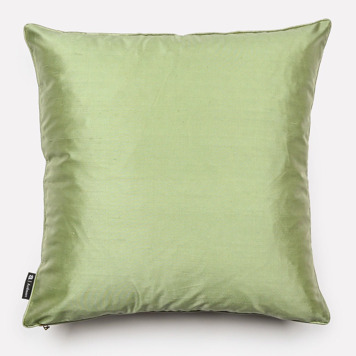 Back view of the Lovebird Leopards Magnolia Silk Cushion Cover in a smooth pistachio green silk, highlighting a minimalistic style.