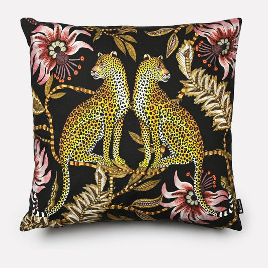 Front view of the Lovebird Leopards Night Cushion Cover featuring two leopards amidst lush floral patterns on a dark background.