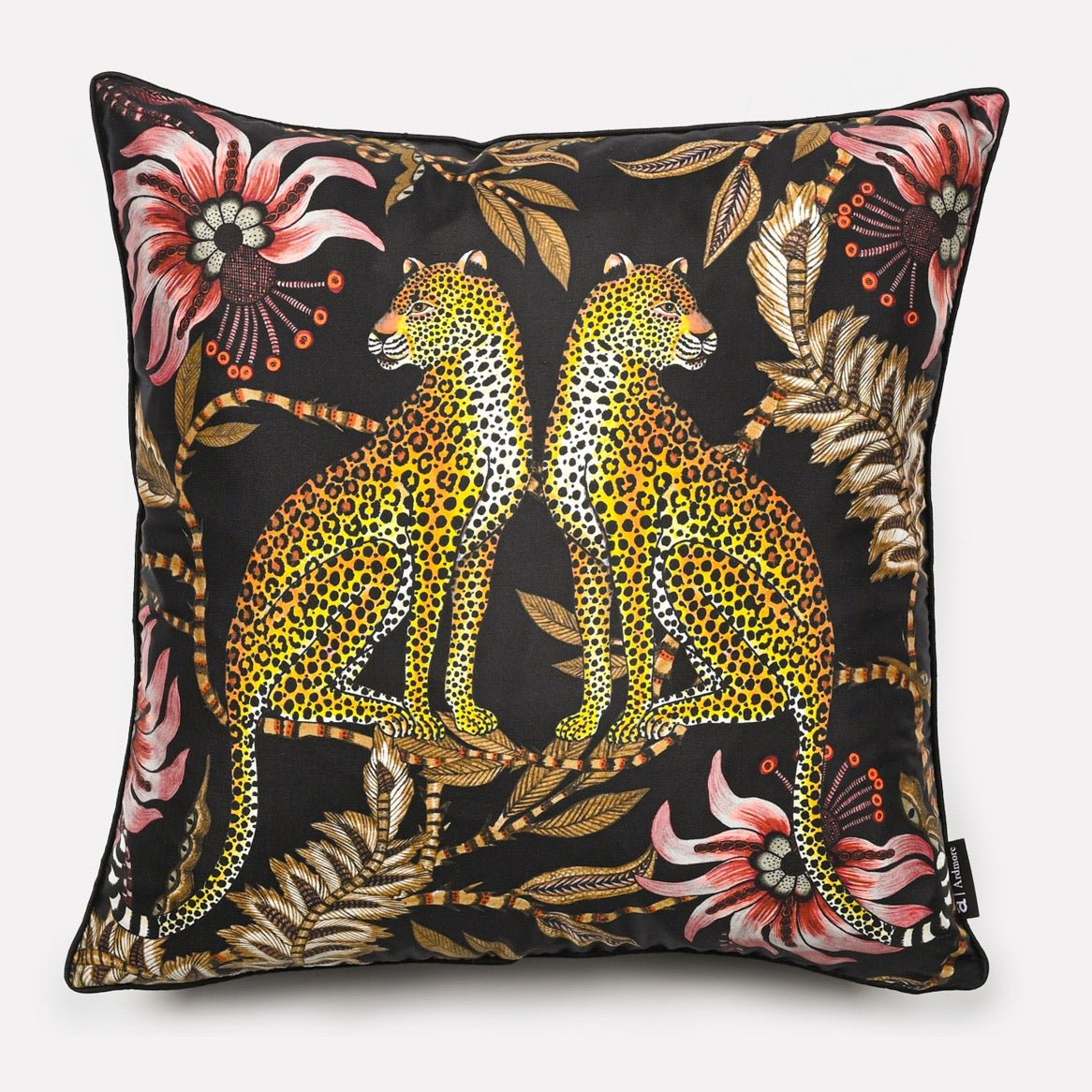 Cushion cover in Lovebird Leopards Night design, featuring a bold print with two leopards surrounded by intricate floral patterns on a dark black background.