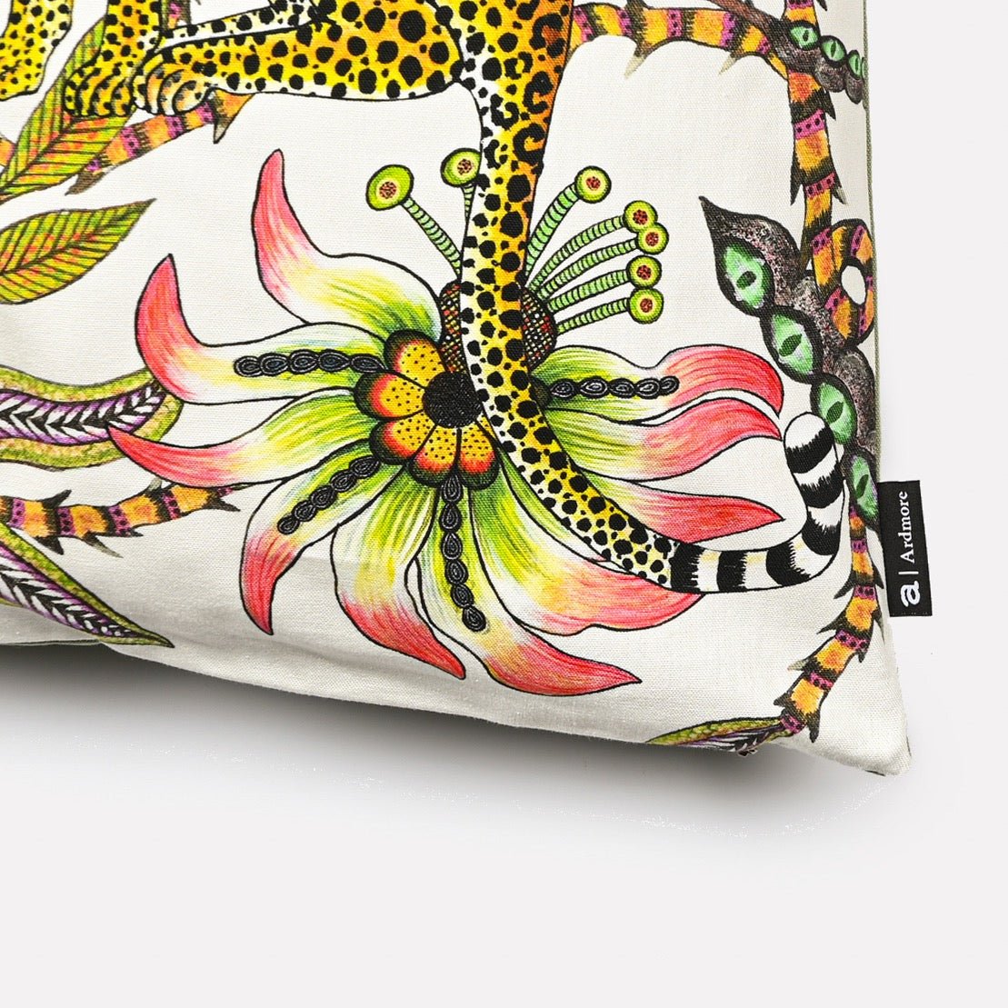 Side view of the Lovebird Leopards Parakeet cushion cover highlighting the detailed floral designs and stitching.