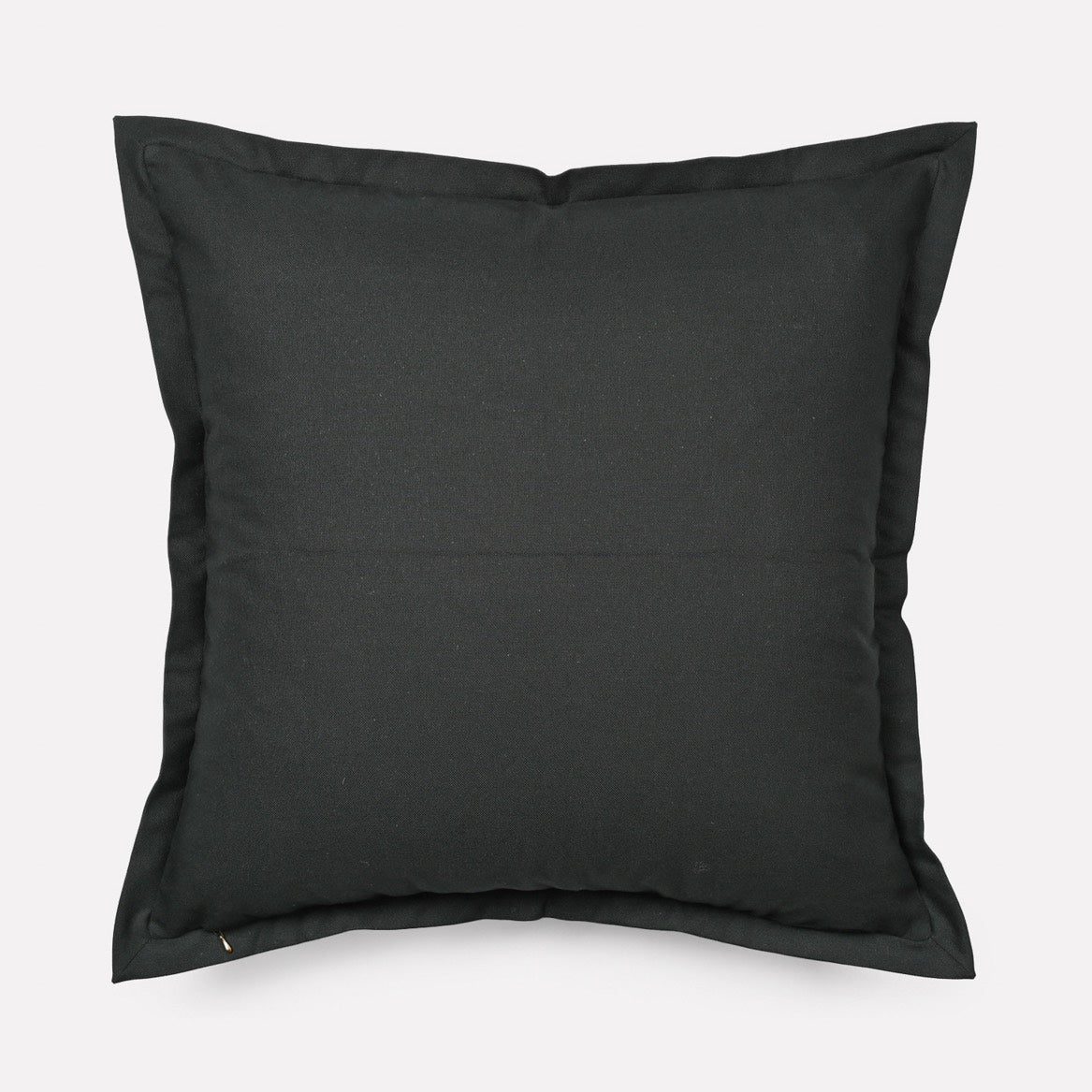 Back view of the Meandering Monkey Sunset Cushion Cover in solid black, showcasing a minimalistic and modern contrast.