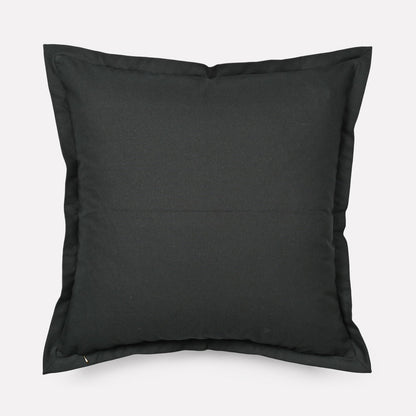 Back view of the Meandering Monkey Sunset Cushion Cover in solid black, showcasing a minimalistic and modern contrast.