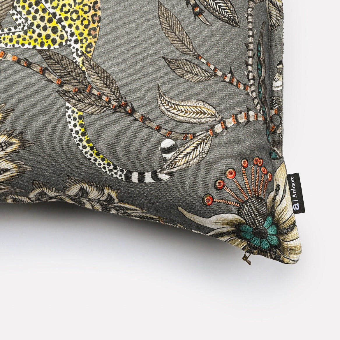 Close-up side view of the Monkey Bean Ash Linen cushion cover highlighting the detailed monkey and floral artwork.