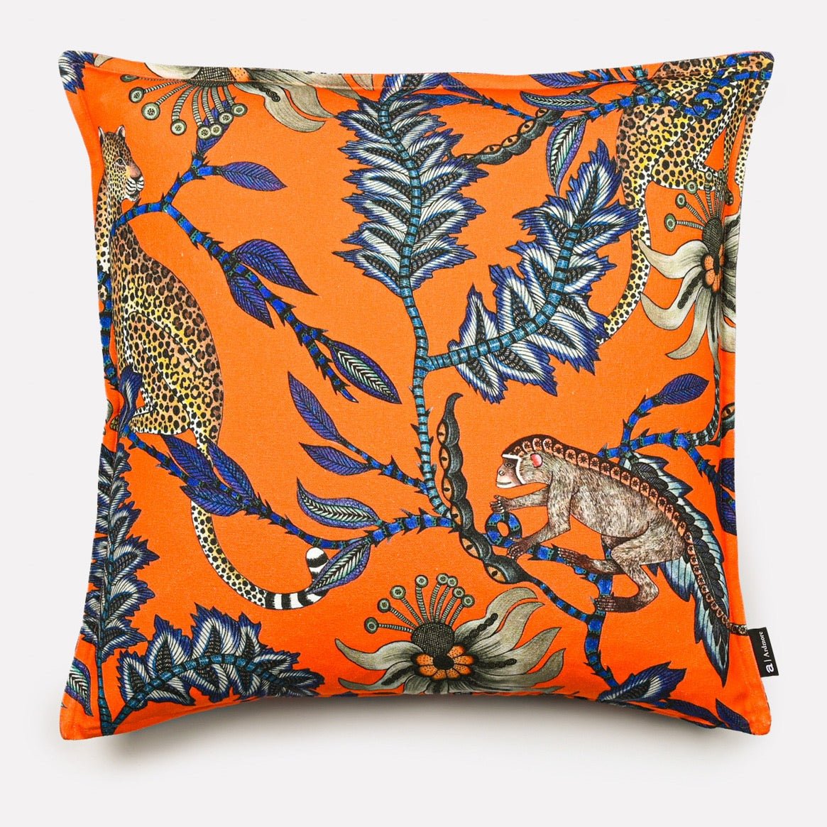 Front view of the Monkey Bean Flame Linen cushion cover featuring vibrant cheetah and floral patterns on a striking orange background.