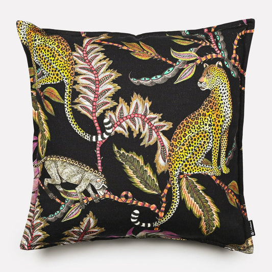 A black linen cushion cover featuring a detailed illustration of golden monkeys and lush tropical foliage, with intricate embroidery-style detailing.