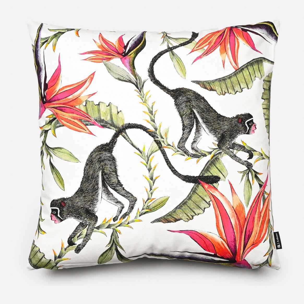 Front view of the Monkey Paradise Chalk Cushion Cover featuring a vibrant design with monkeys and bold red and green foliage on a white background.