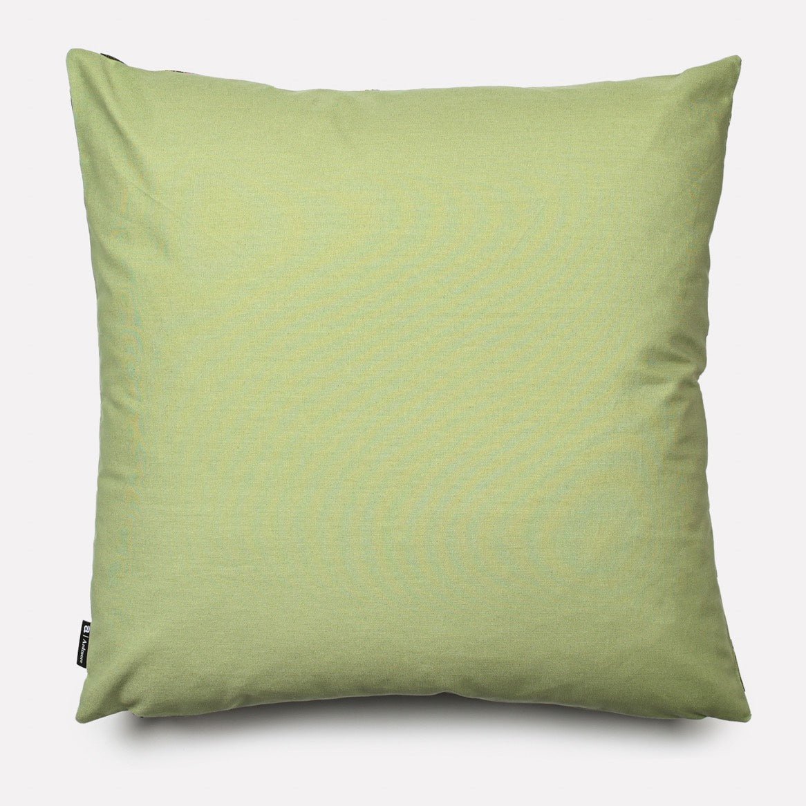 Back view of the Monkey Paradise Chalk Cushion Cover, showcasing a plain pistachio green cotton fabric.