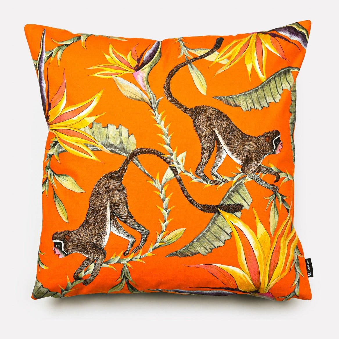 Front view of the Monkey Paradise Flame Cushion Cover, featuring vibrant orange and yellow foliage with playful monkey illustrations.