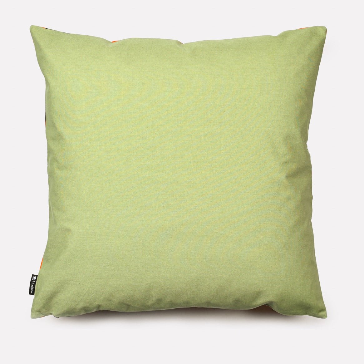 Back view of the Monkey Paradise Flame Cushion Cover, showing a plain pistachio green cotton finish.