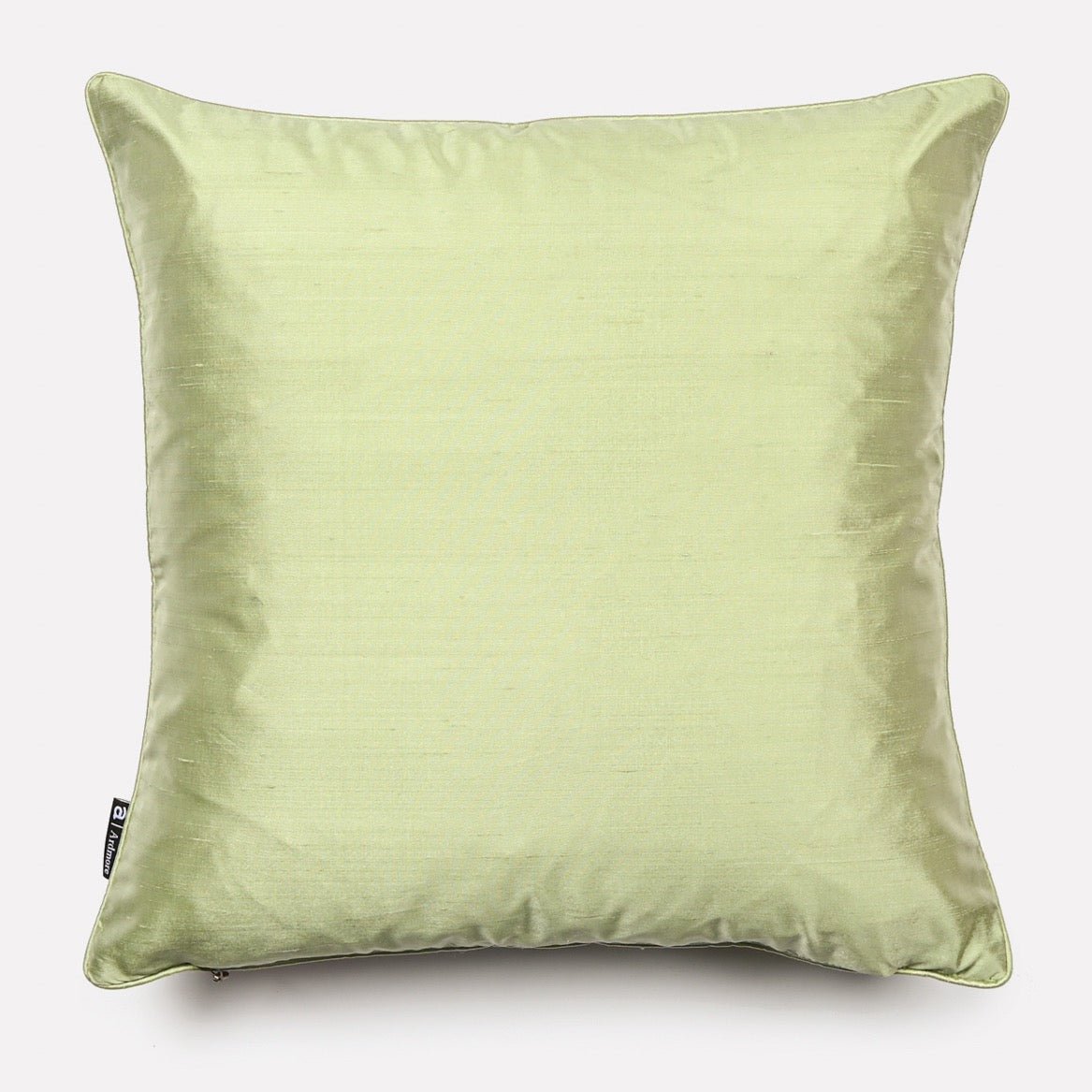 Back view of the Monkey Paradise Stone Silk Cushion Cover in solid pistachio green silk fabric.