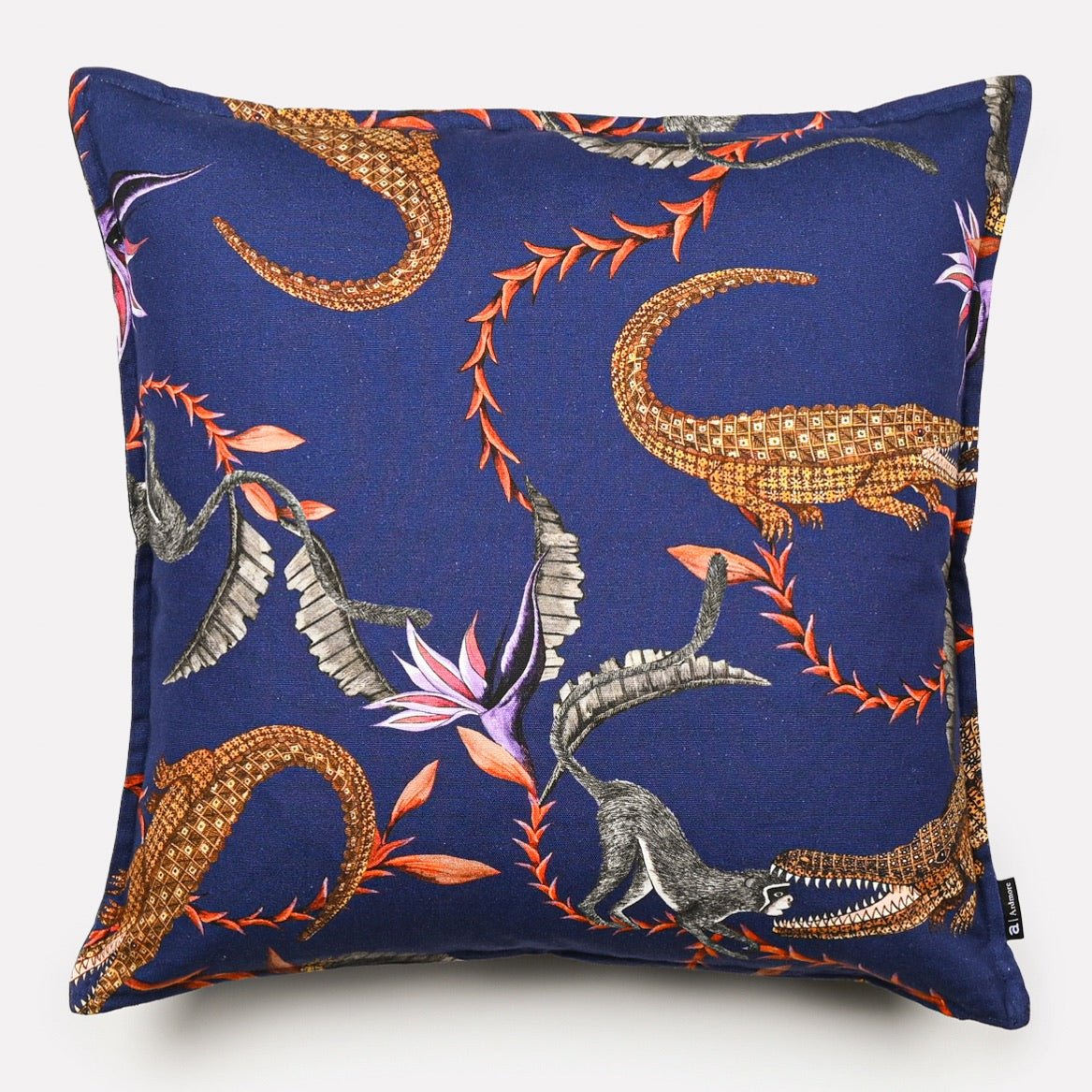 Front view of the River Chase Royal Linen cushion cover featuring a vibrant crocodile and floral design on a royal blue background.