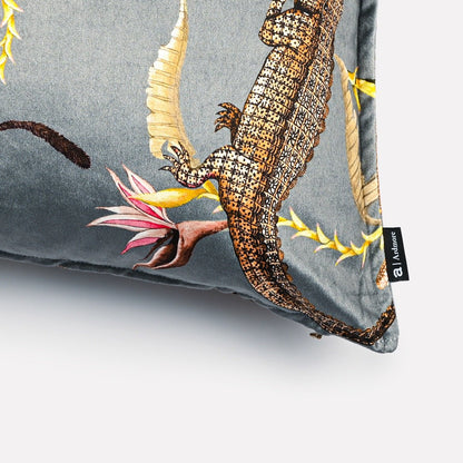 Close-up of the intricate details on the River Chase Silver Ripple Velvet Cushion Cover, highlighting the alligator motif and vibrant foliage accents.