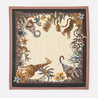 A full view of the Ardmore Sabie Forest Napkin in Stone, showcasing a detailed composition of African flora and fauna, framed by an elegant border.