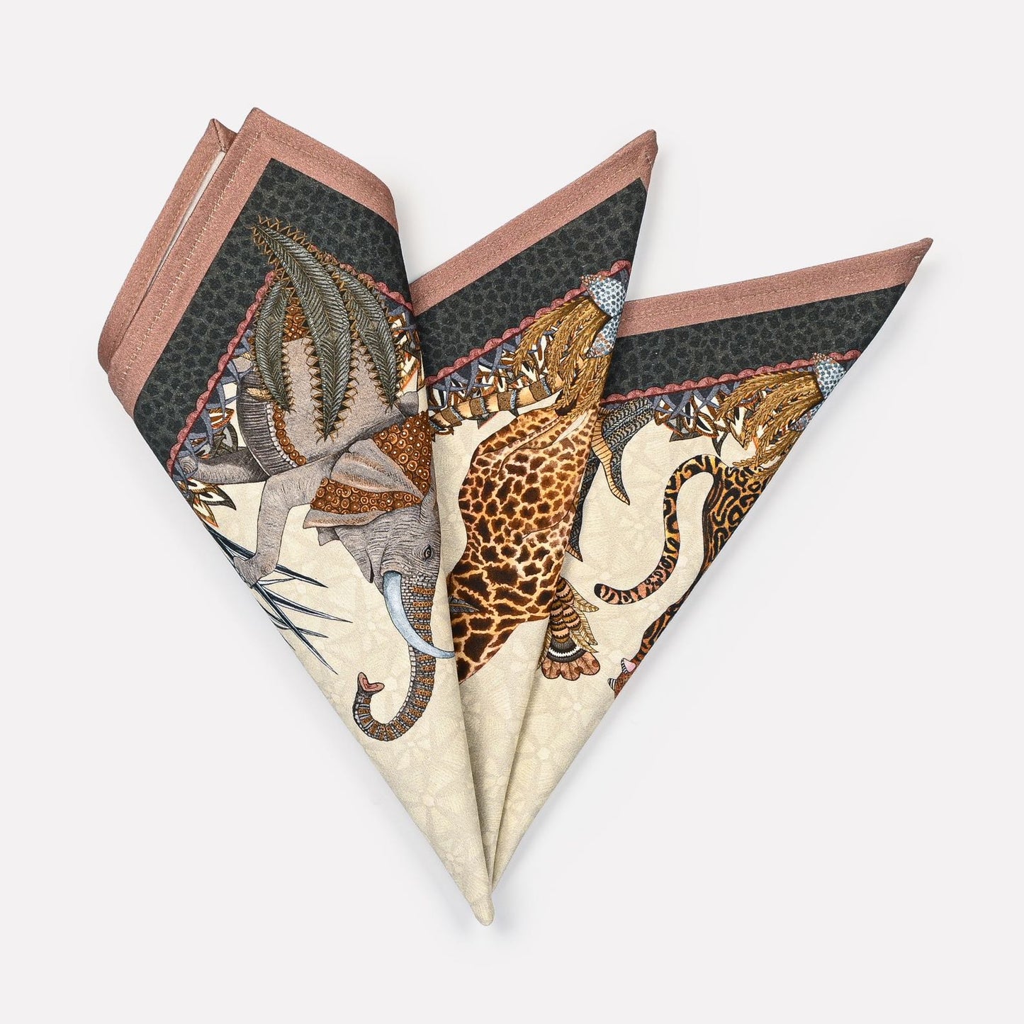 A pair of Ardmore Sabie Forest Napkins in Stone, folded into a fan shape, highlighting the intricate wildlife and foliage-inspired design on a neutral stone background.