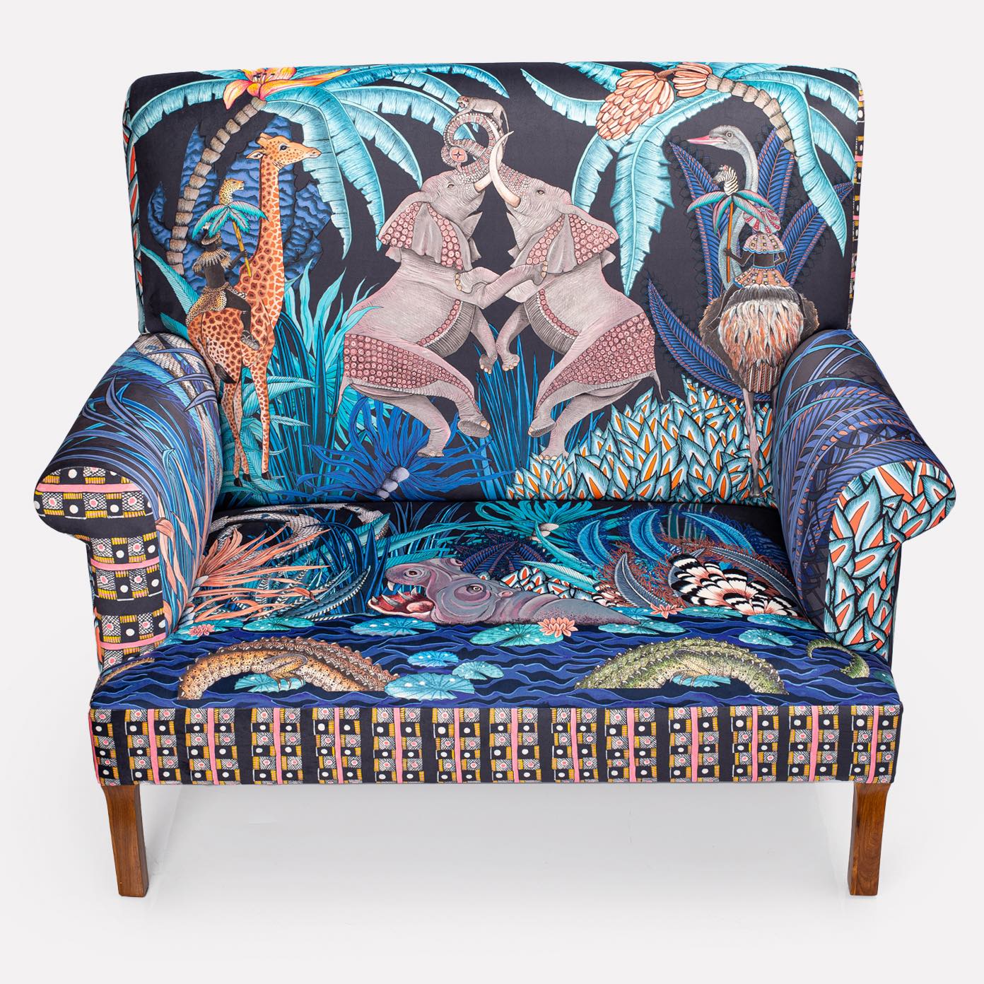 A detailed shot of the sofa’s high back, displaying the storytelling elements woven into the fabric.