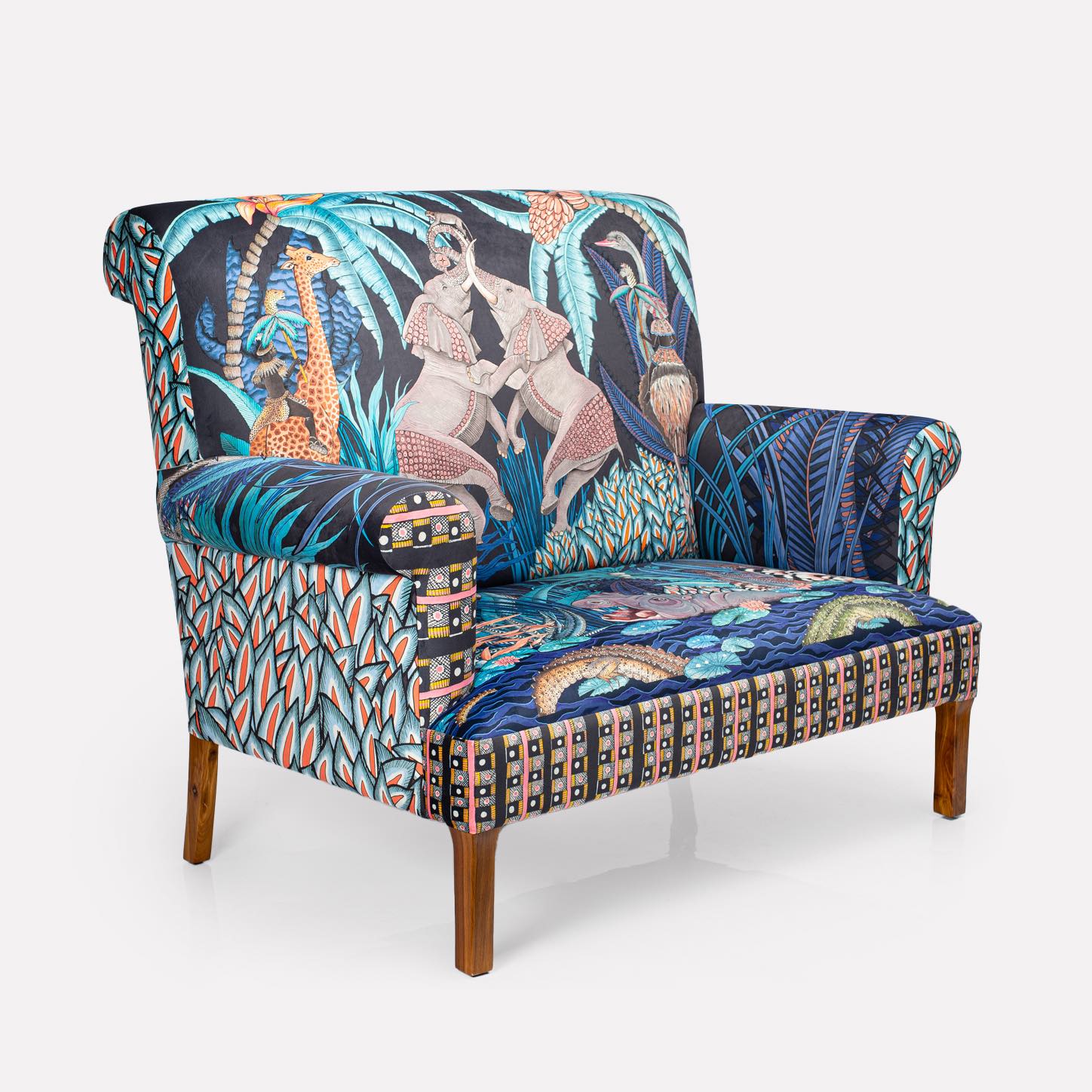 A three-quarter view from the left, displaying the armrest and front panel with its detailed animal motifs.