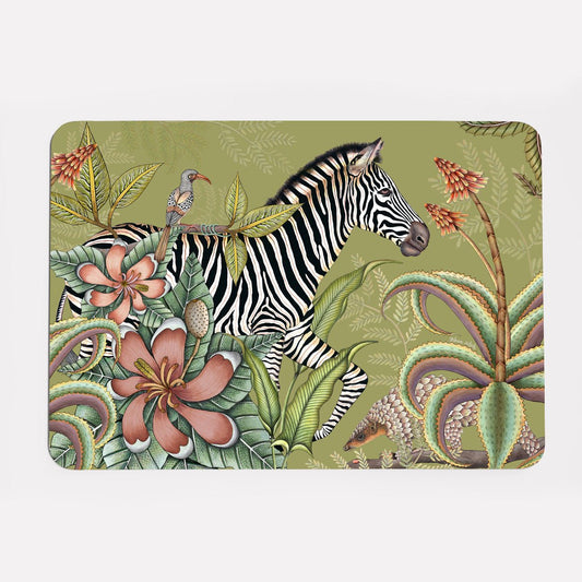 A hardboard placemat featuring a zebra among lush magnolias, flowering aloes, and intricate foliage on a muted green background.