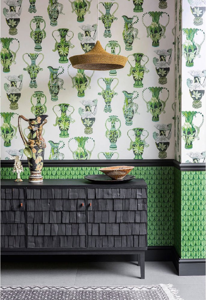 A sophisticated space showcasing the wallpaper's intricate watercolour vase design in vibrant green tones.