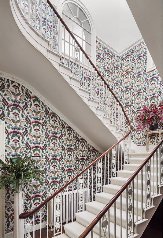 A luxurious staircase adorned with the vibrant Nene wallpaper, showcasing its intricate patterns and dynamic colour palette.