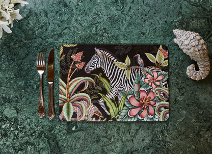 The placemat set elegantly displayed on a dining table with complementary decor, showcasing its sophisticated aesthetic.